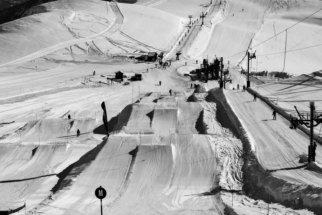 Monochrome Ski Resort with Snowy Terrain and Ski Lift - Free Images, Stock Photos and Pictures on Pikwizard.com