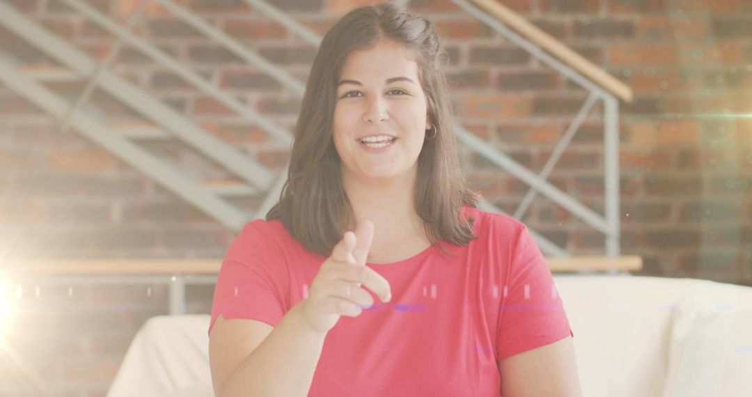 Confident Female Vlogger Engaging with Audience at Home