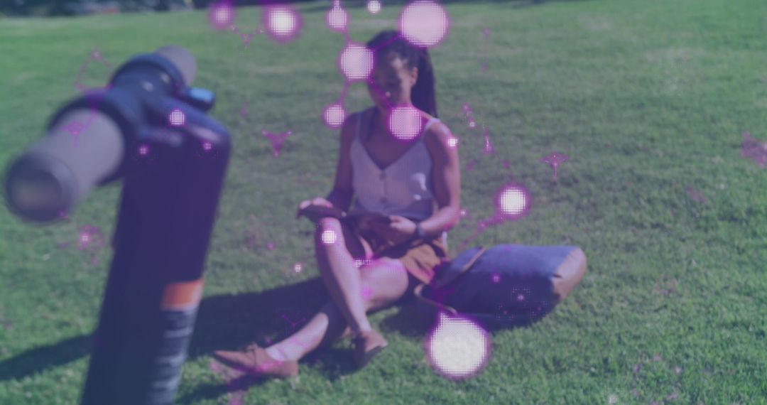 Woman Enjoying Outdoor Reading with Digital Overlay and Telescope