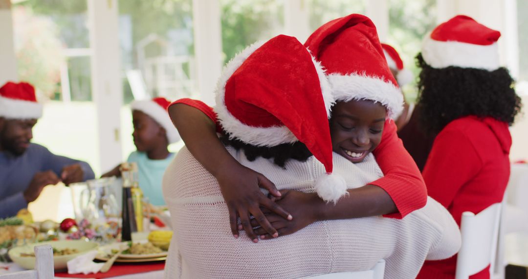 Joyful African Family Celebrating Christmas with Hugs and Smiles - Free Images, Stock Photos and Pictures on Pikwizard.com