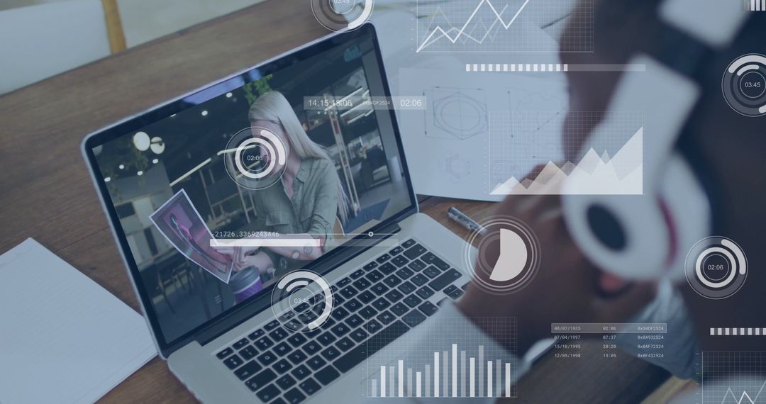 Remote Work Space with Laptop and Analytical Graphics Overlay