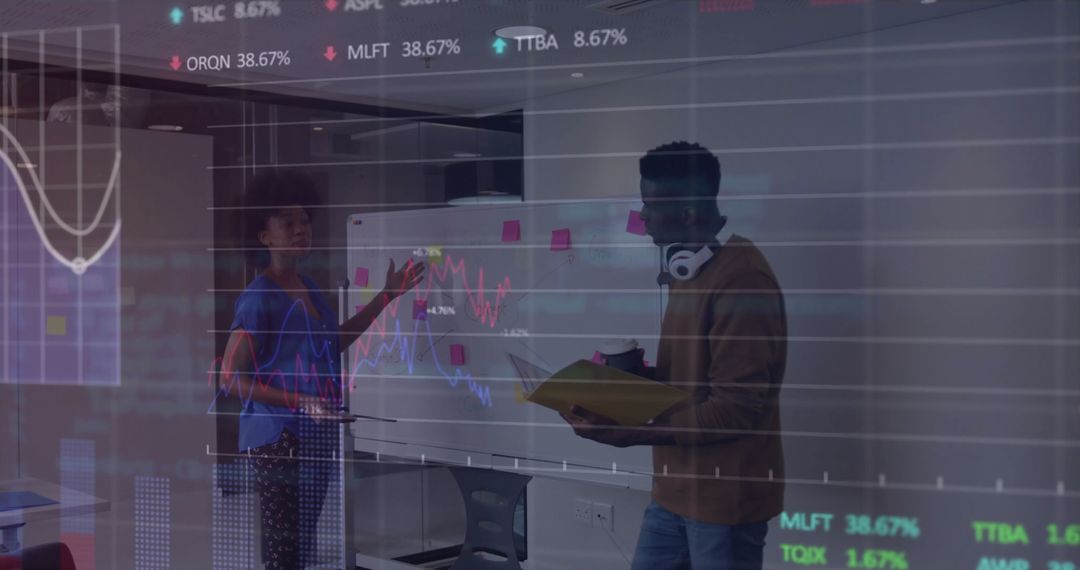 Colleagues Analyzing Financial Data and Stock Charts in Modern Office