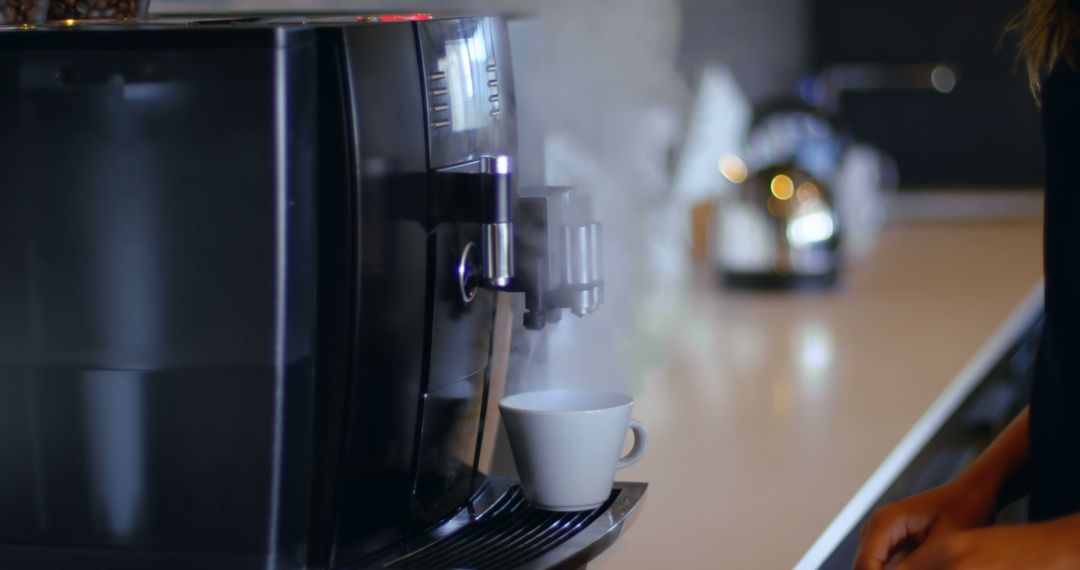 Steaming Cup of Coffee in Modern Kitchen with Espresso Machine - Free Images, Stock Photos and Pictures on Pikwizard.com