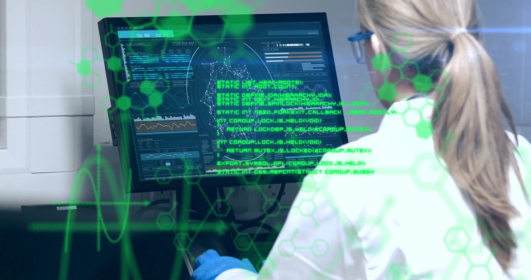 Female Scientist Analyzing Scientific Data on Computer in Laboratory