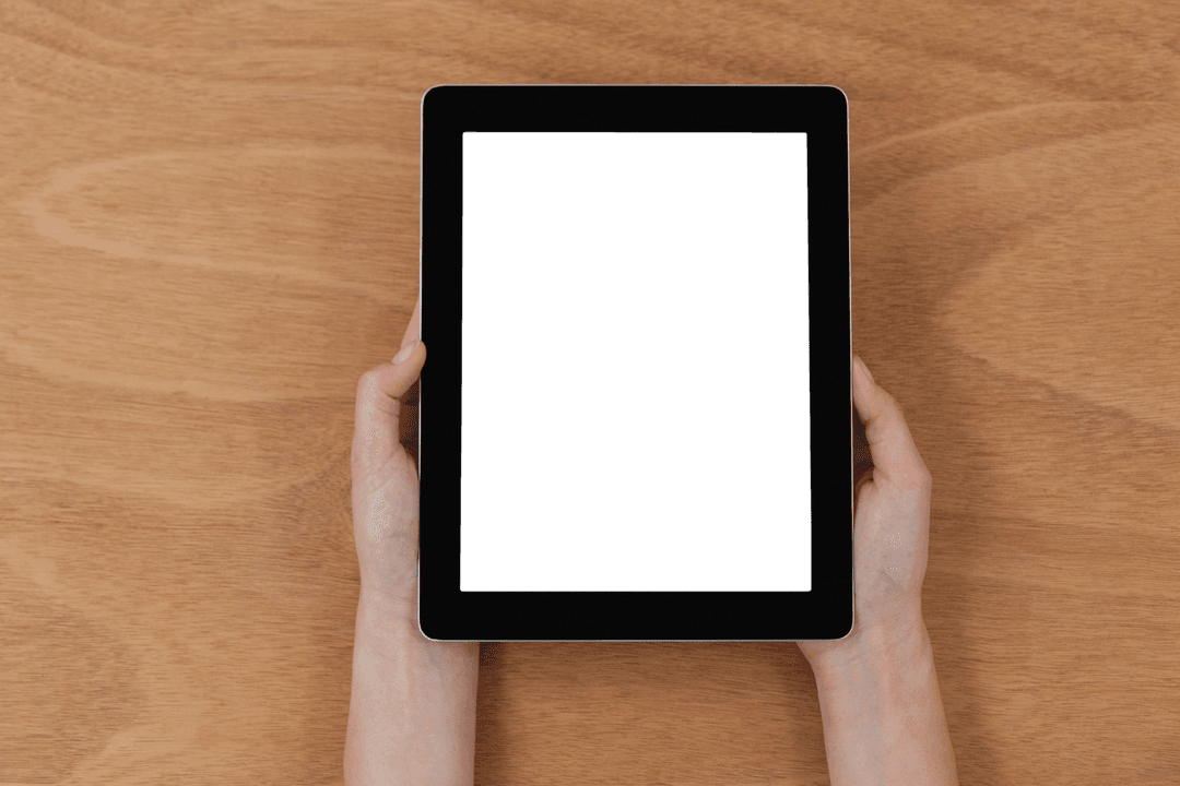Hands Holding Digital Tablet with Transparent Screen on Wood Background
