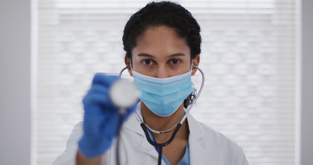 Female Doctor Holding Stethoscope Towards Camera - Free Images, Stock Photos and Pictures on Pikwizard.com