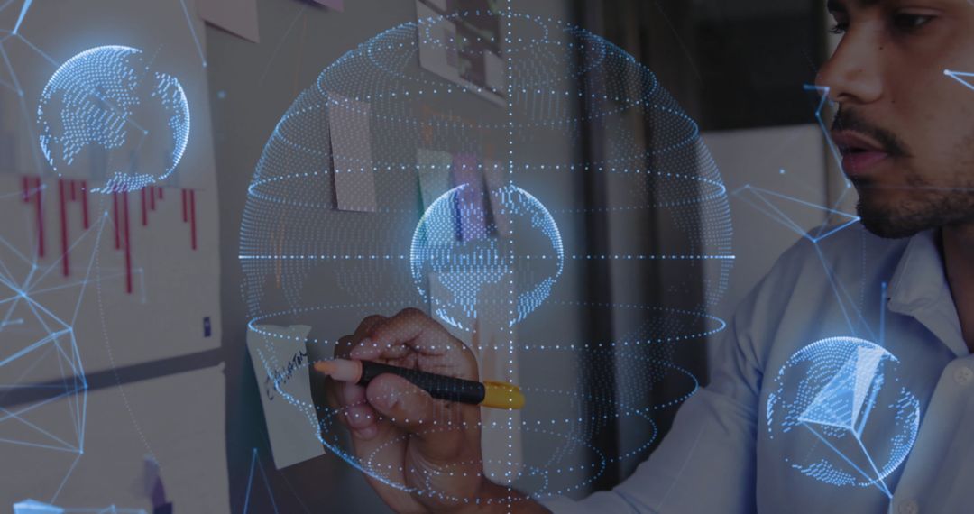 Engineer Writing Notes with Futuristic Holographic Globes