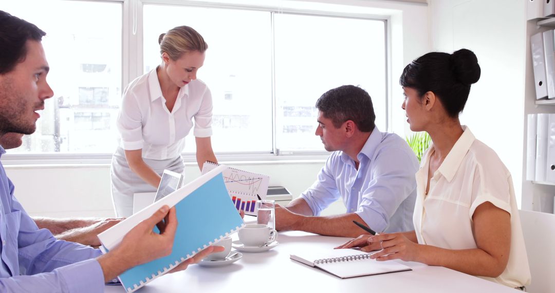 Corporate Team Collaborating in Modern Office Environment