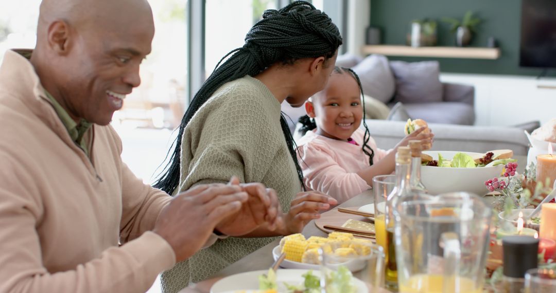 Happy African American Family Enjoying Meal Together - Free Images, Stock Photos and Pictures on Pikwizard.com