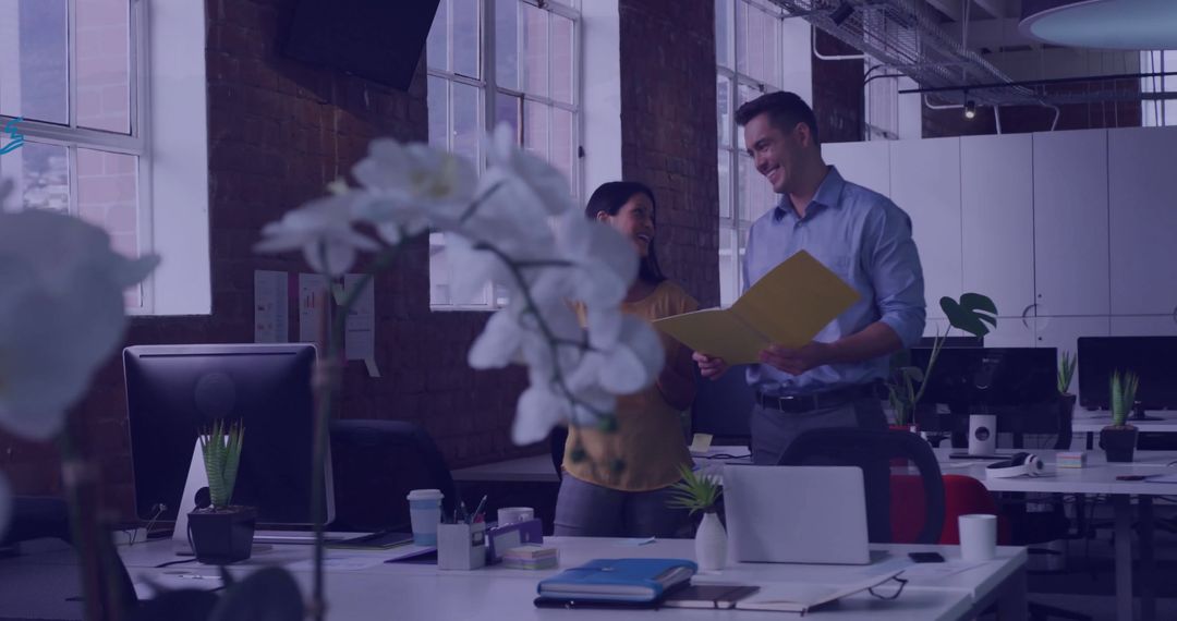 Business Professionals Collaborating in Open-Plan Workspace
