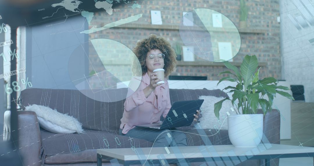 Businesswoman Analyzing Data on Tablet with Coffee in Modern Office - Free Images, Stock Photos and Pictures on Pikwizard.com