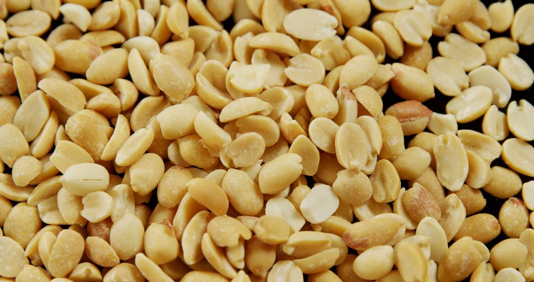 Close-Up of Numerous Roasted and Shelled Peanuts - Free Images, Stock Photos and Pictures on Pikwizard.com