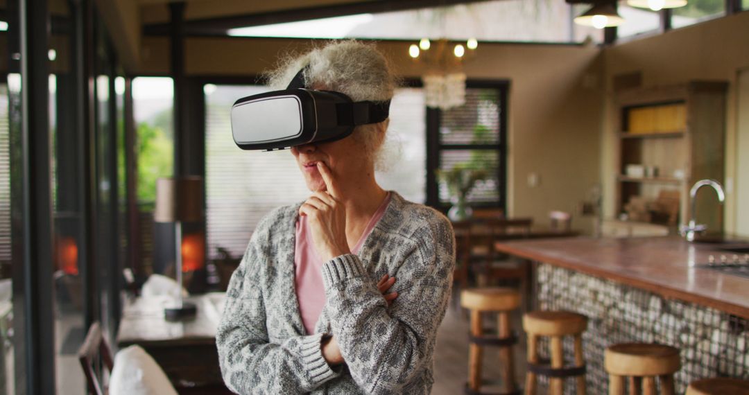 Senior Woman Experiencing Virtual Reality in Modern Home - Free Images, Stock Photos and Pictures on Pikwizard.com