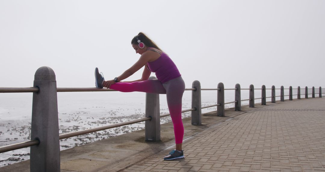 Woman Stretching Leg during Morning Workout Outdoors - Free Images, Stock Photos and Pictures on Pikwizard.com