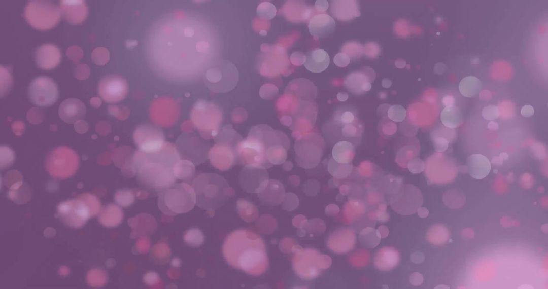 Abstract Pink Bokeh Background on Soft Purple