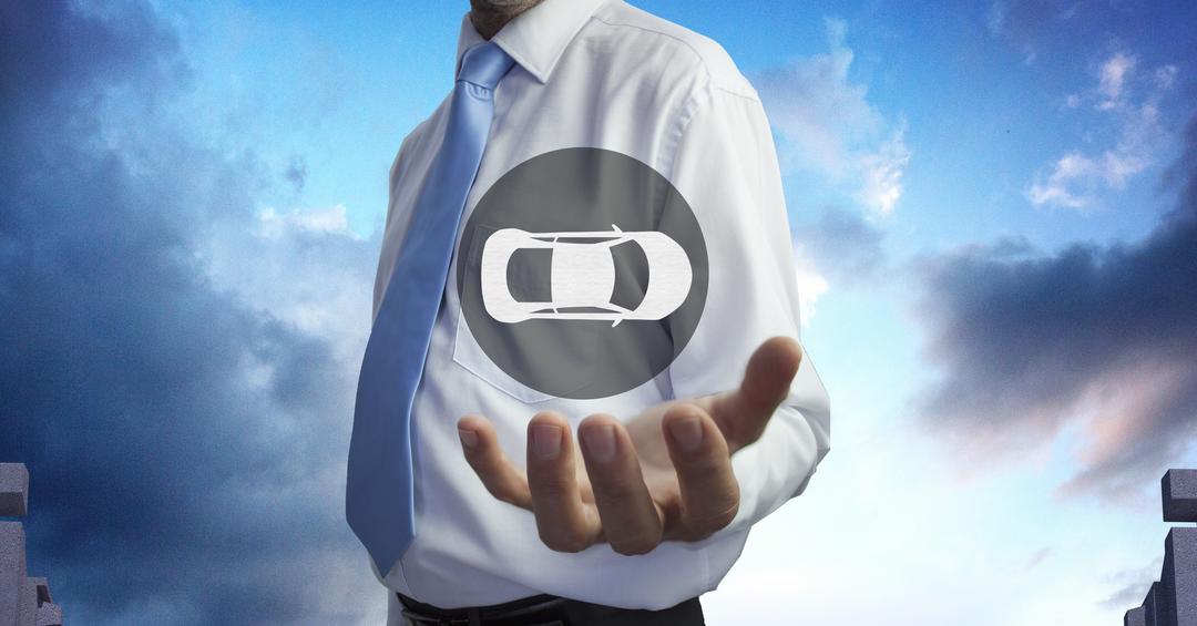 Businessman Holding Virtual Car Icon Against Sky - Free Images, Stock Photos and Pictures on Pikwizard.com