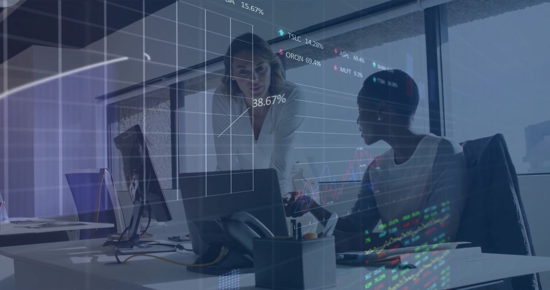 Financial Analysts Discussing Real-Time Data in Office