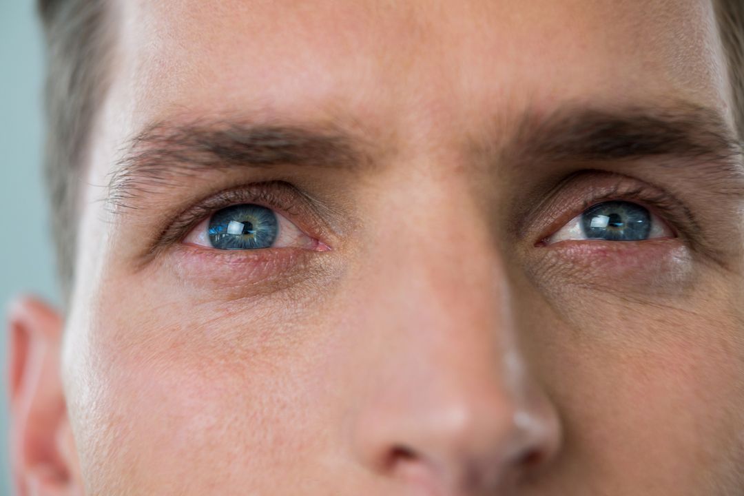 Close-Up of Man's Blue Eyes - Free Images, Stock Photos and Pictures on Pikwizard.com
