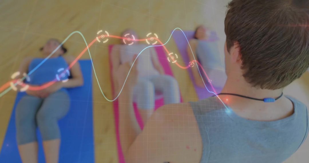 Instructor Monitoring Yoga Class with Real-time Biometric Data