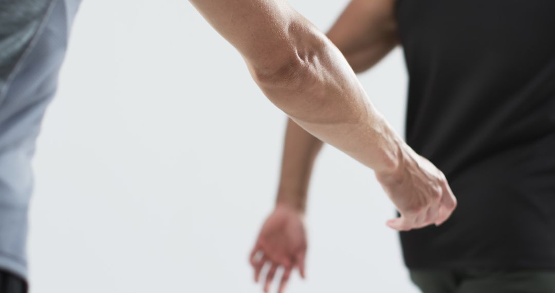 Close-up of Relay Baton Handoff in Competitive Race