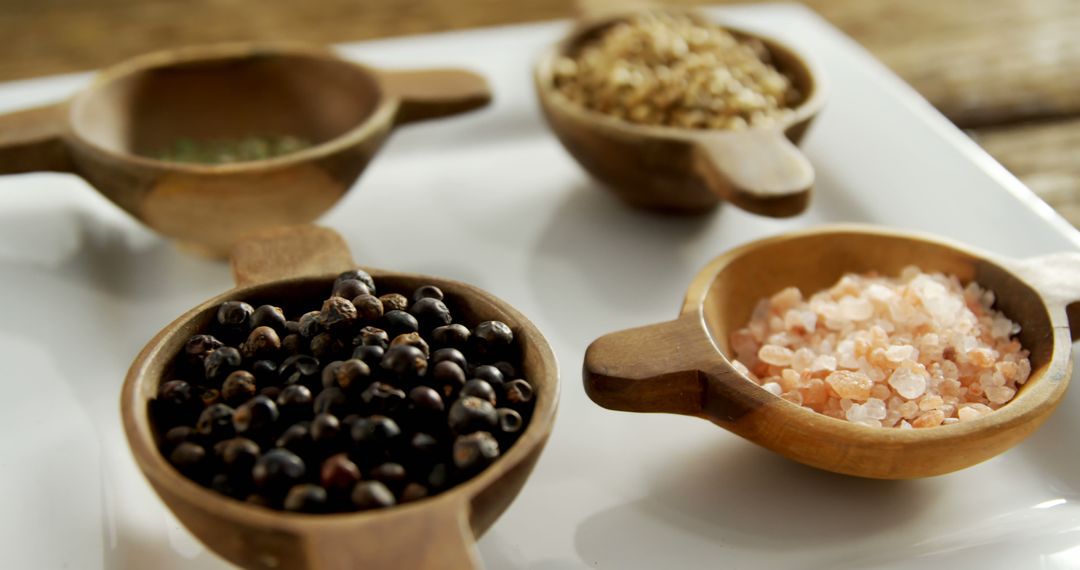 Assorted Herbs and Spices in Wooden Bowls on White Background - Free Images, Stock Photos and Pictures on Pikwizard.com