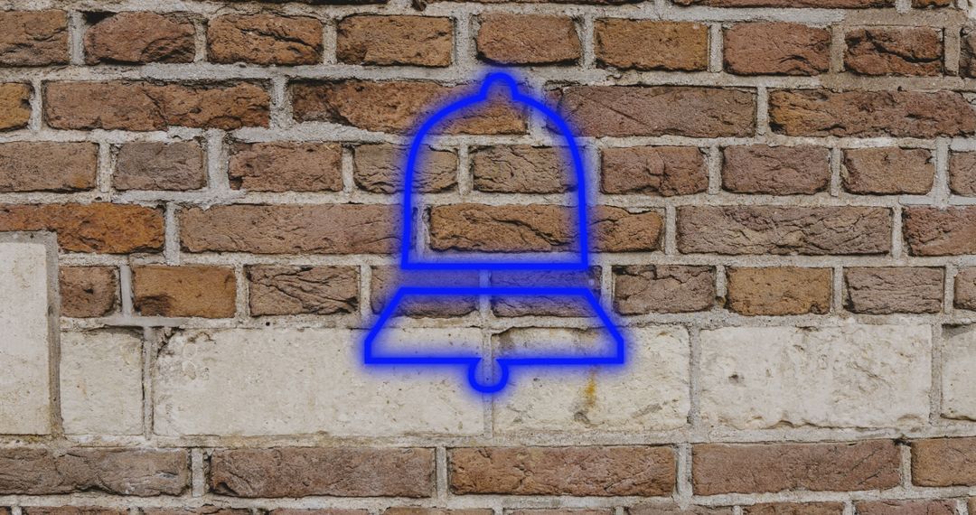 Glowing Blue Notification Bell Icon Against Brick Wall - Free Images, Stock Photos and Pictures on Pikwizard.com