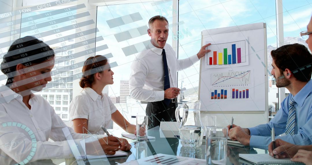 Business Team Analyzing Financial Charts in Modern Office - Free Images, Stock Photos and Pictures on Pikwizard.com