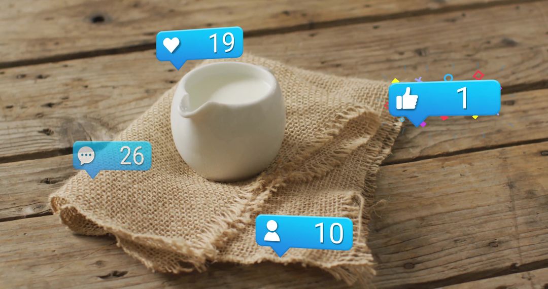 White Ceramic Pitcher and Social Media Icons on Rustic Table