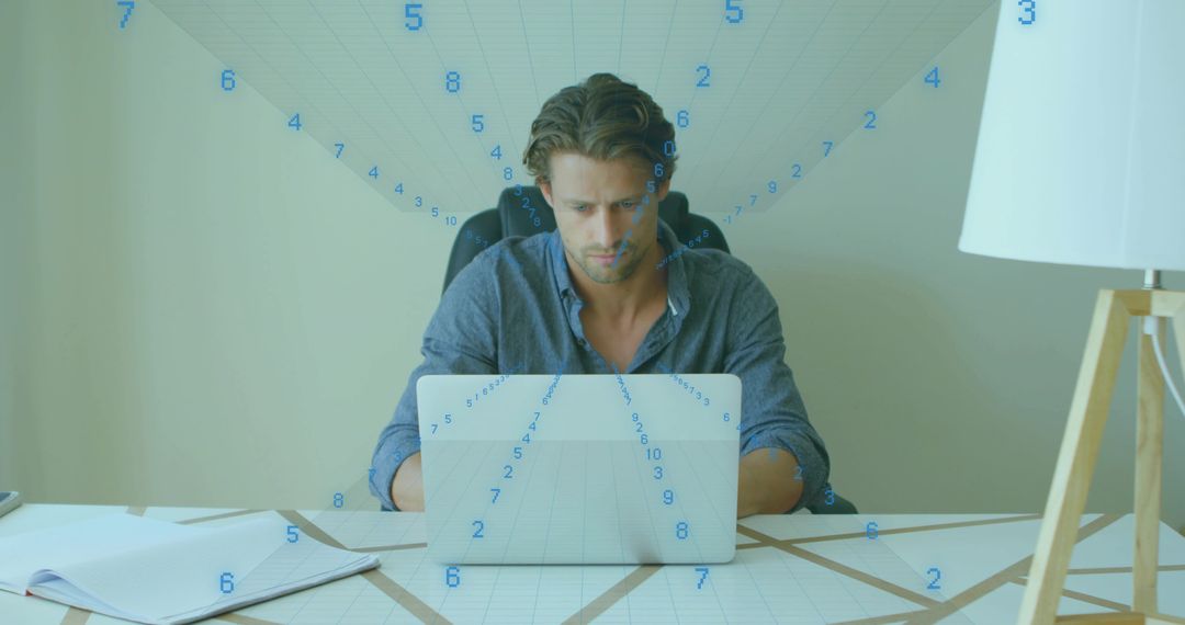 Focused man typing on laptop with digital grid and numeric overlay suggesting data and augmented rea