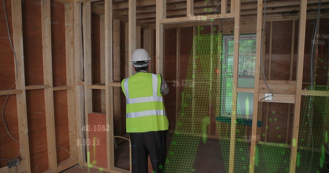 Engineer Analyzing Data at Construction Site with Digital Overlay