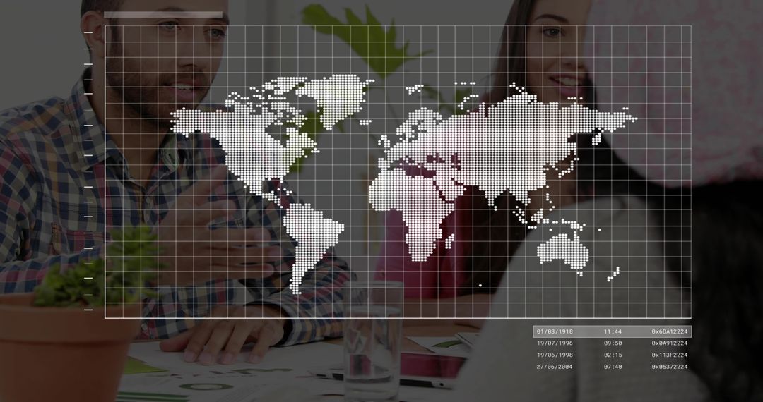 Coworkers discussing global strategy with world map overlay at meeting table
