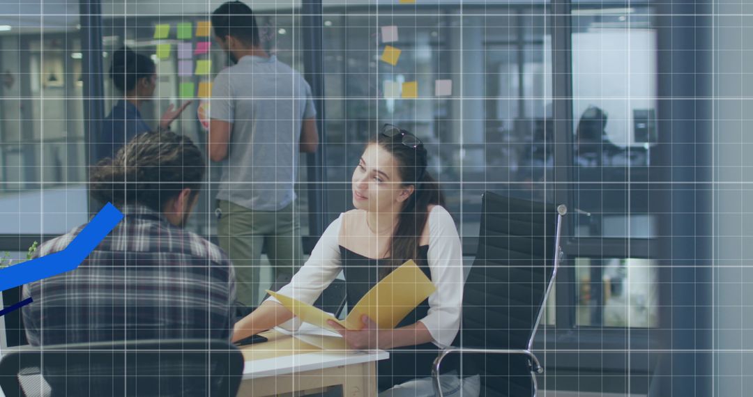 Collaborative Teamwork Strategy Meeting in Modern Office