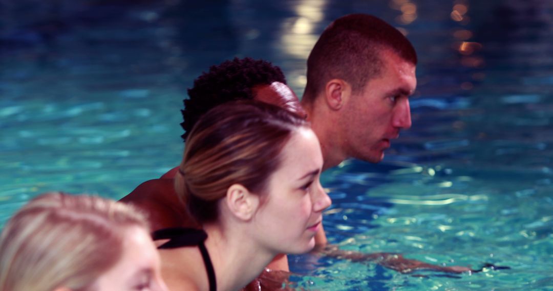 Focused Swimmers Preparing for Competition in Pool - Free Images, Stock Photos and Pictures on Pikwizard.com