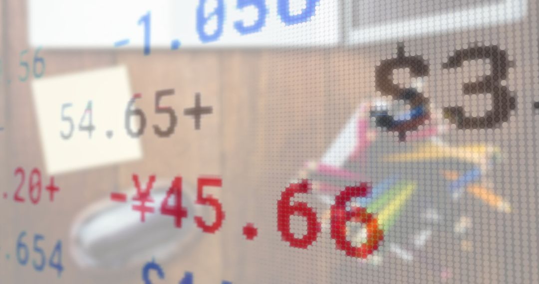 Blurred Digital Finance Interface Over Office Workspace