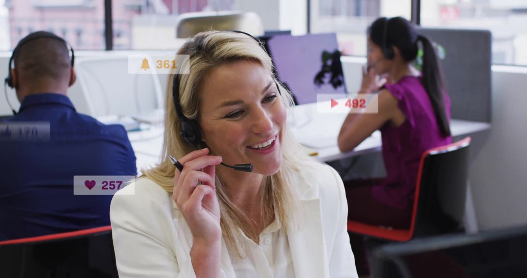 Smiling Businesswoman Using Headset in Busy Office Environment