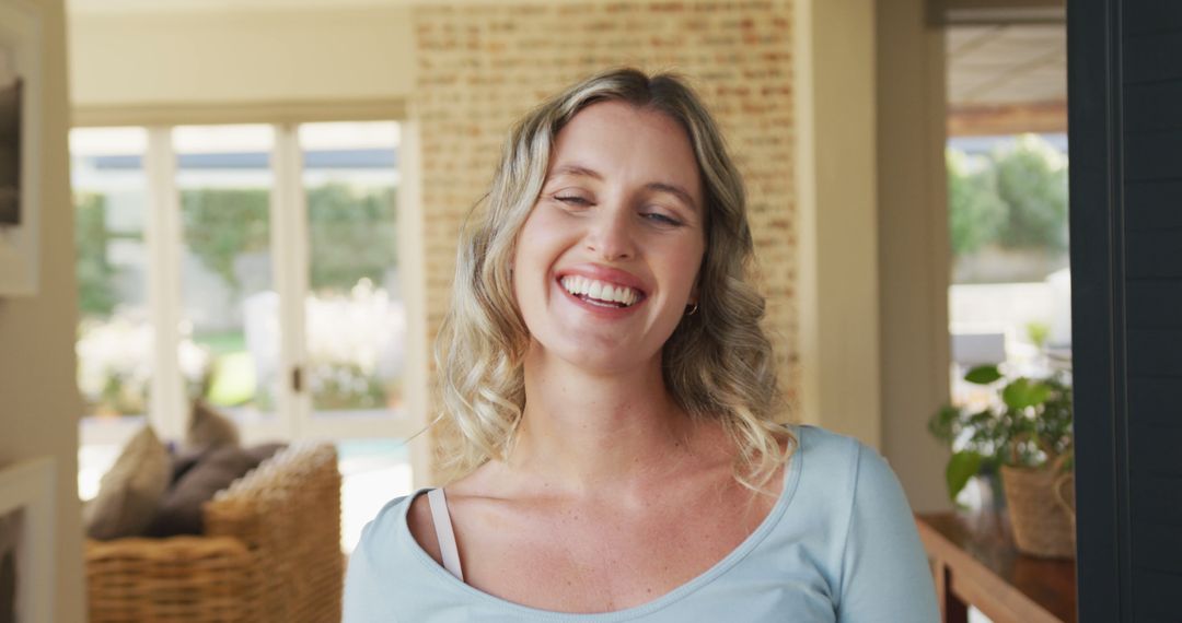 Image of happy smiling caucasian woman inside of house - Free Images, Stock Photos and Pictures on Pikwizard.com