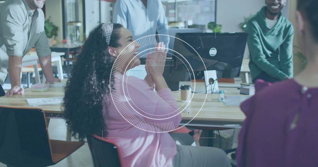 Diverse Team Collaborating with Financial Data Visualization in Modern Office