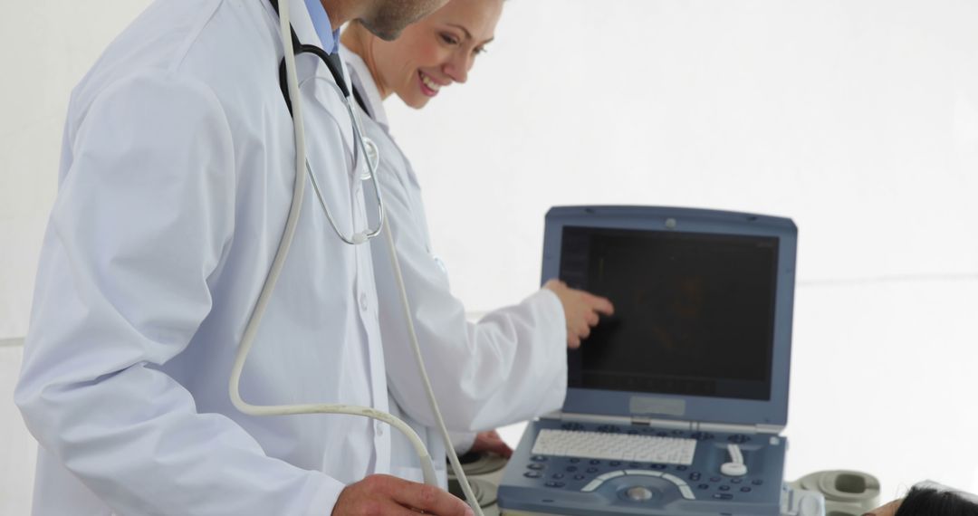 Doctors Using Ultrasound Machine During Medical Examination - Free Images, Stock Photos and Pictures on Pikwizard.com