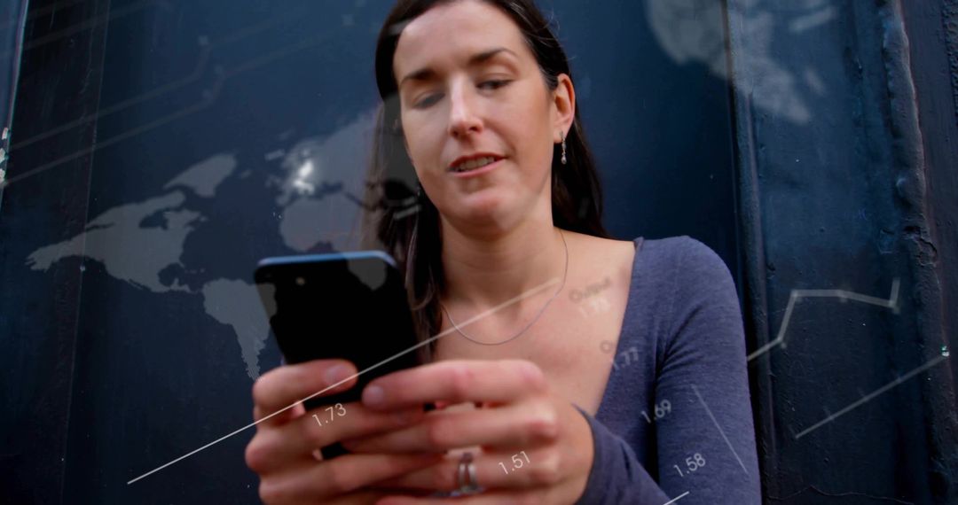 Woman Analyzing Data on Smartphone Against Digital Graph Overlays