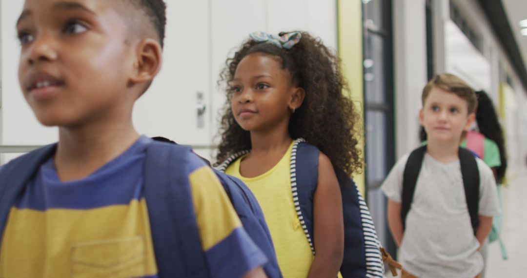 Diverse Students Smiling in School Corridor Before Class