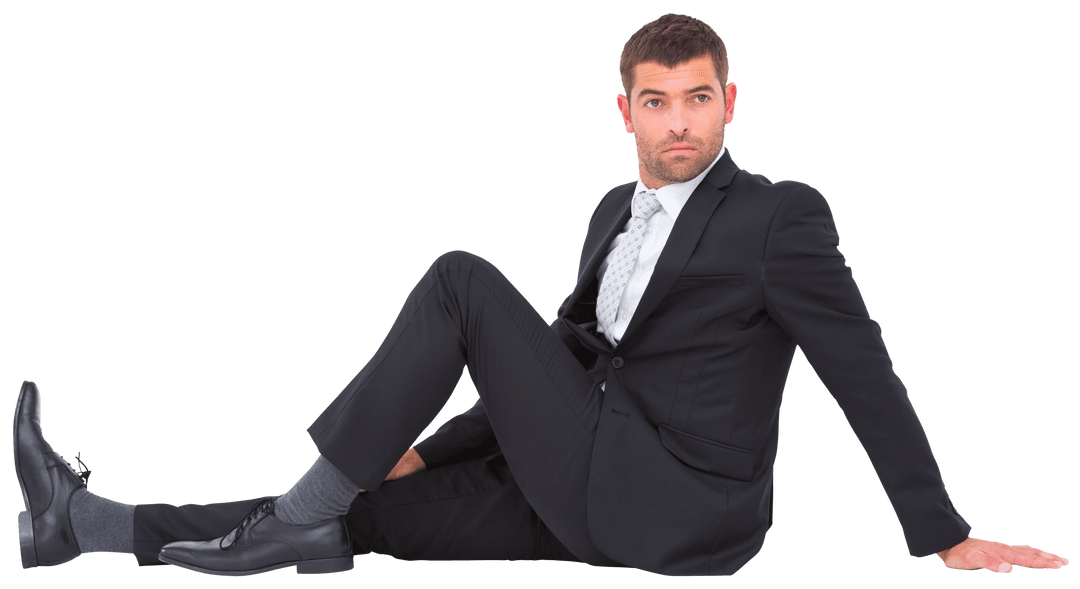 Businessman Sitting on Floor in Black Suit with Pensive Look Transparent