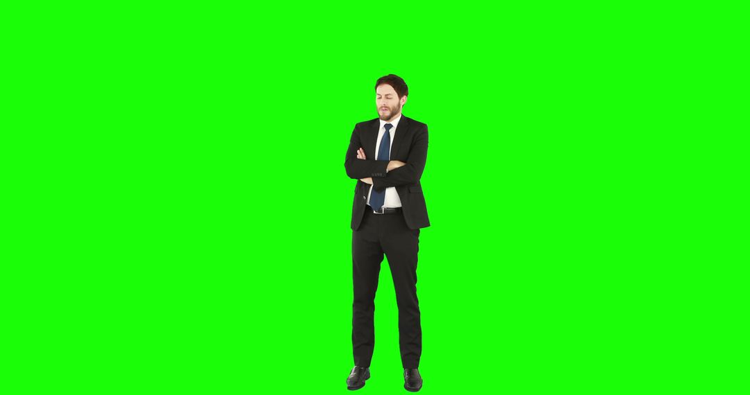 Confident Businessman Posing Against Green Screen Background - Free Images, Stock Photos and Pictures on Pikwizard.com