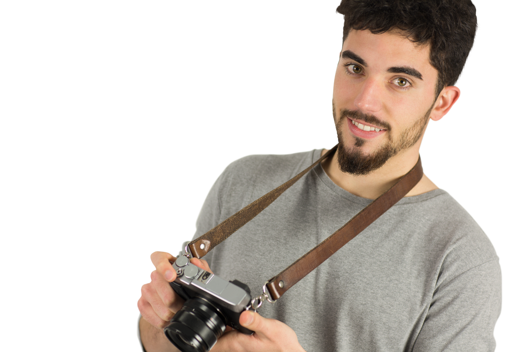 Smiling Man Holding Vintage Camera Shot in Studio on Transparent Background - Download Free Stock Images Pikwizard.com