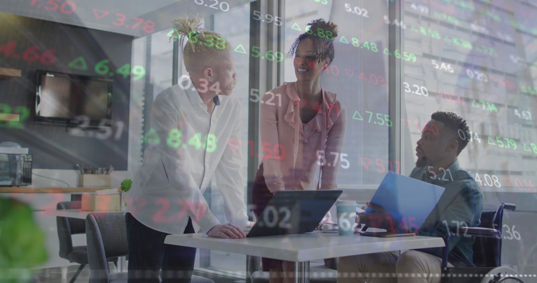 Diverse Business Team Analyzing Market Data in Modern Office