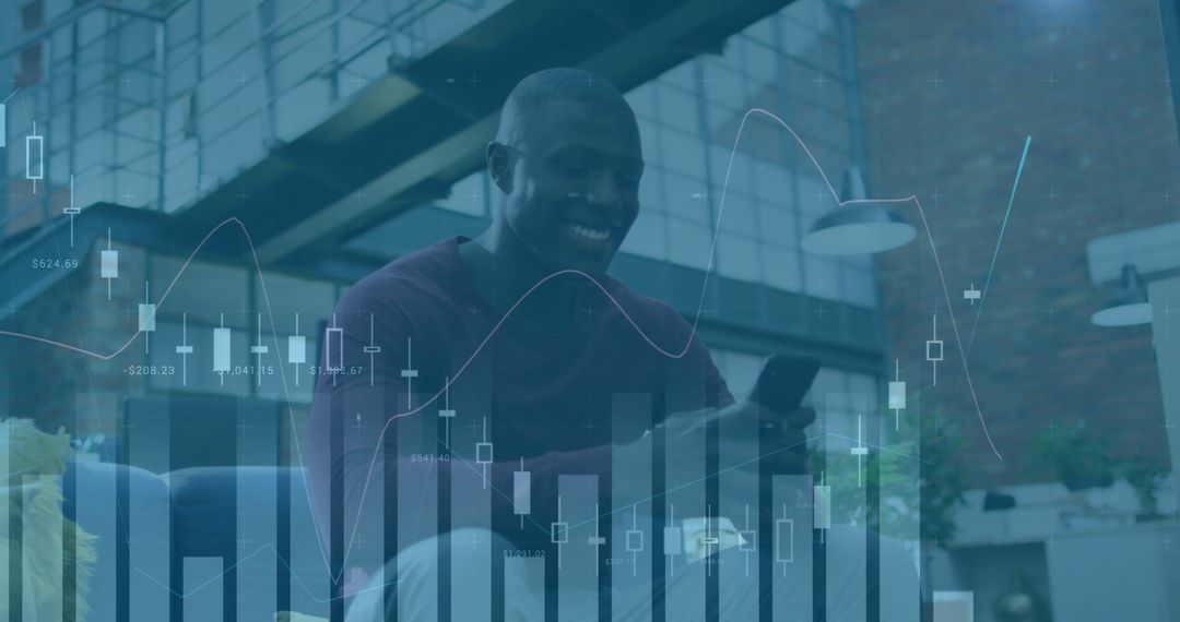 Smiling Businessman Using Smartphone with Financial Graphs Overlay