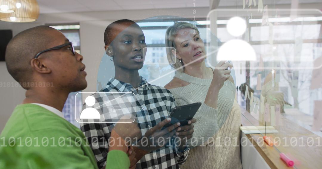 Diverse Professionals Collaborating on Digital Interface in Modern Office