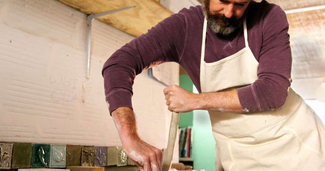 Man with Beard Making Pottery in Craft Studio - Free Images, Stock Photos and Pictures on Pikwizard.com