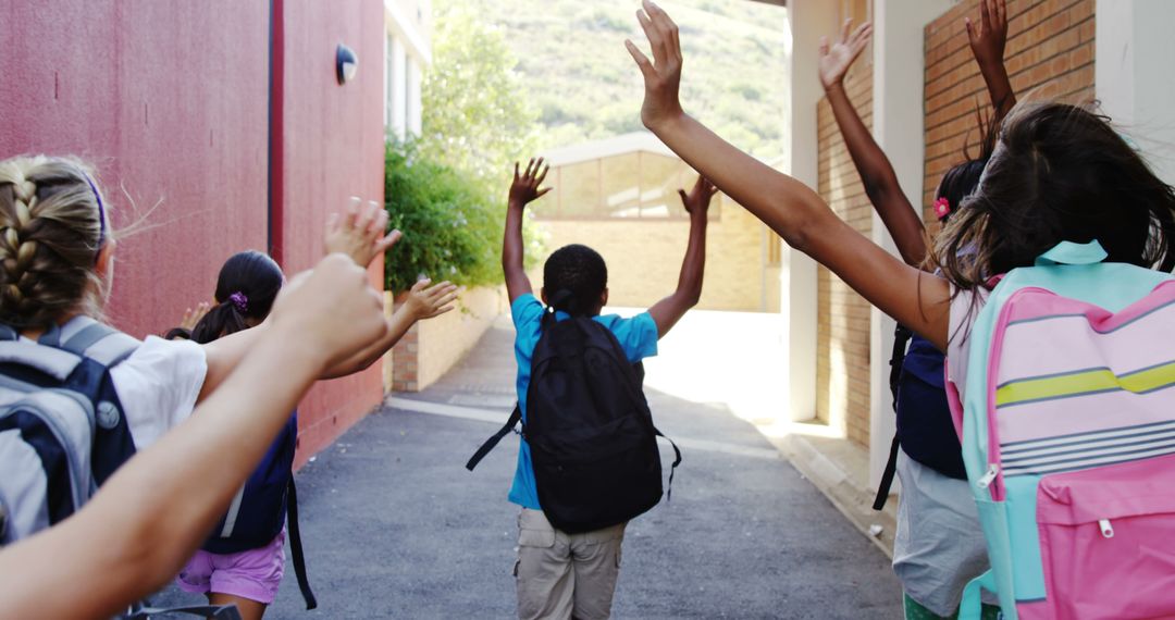 Excited Children with Backpacks Running after School