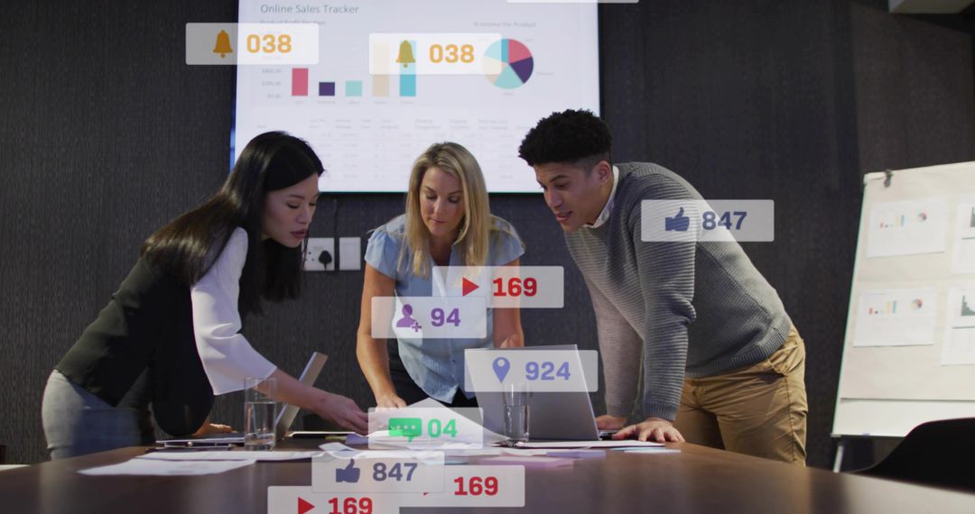 Team Collaborating and Analyzing Social Media Metrics with Charts and Laptop in Boardroom