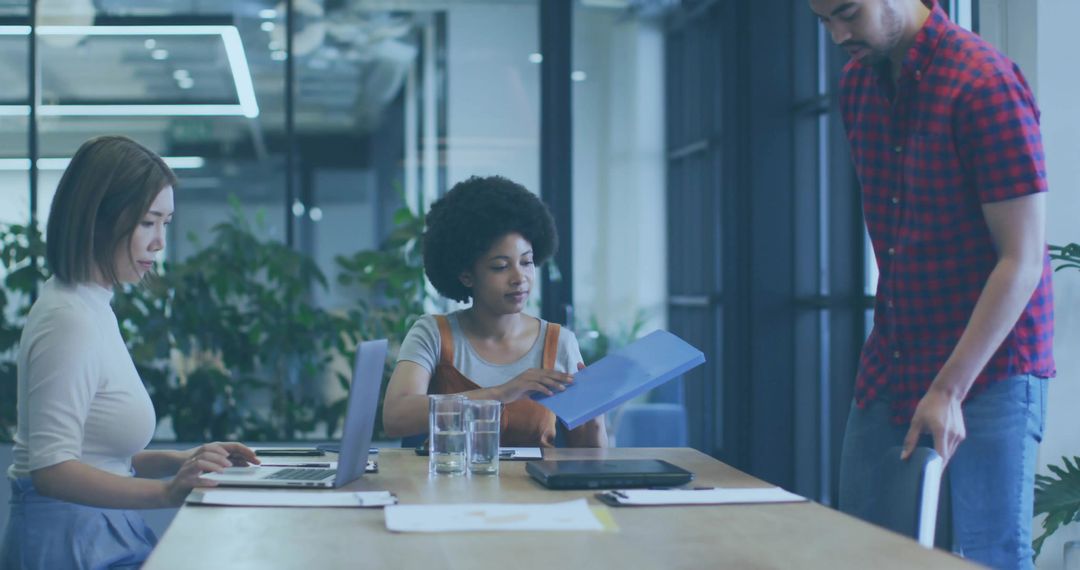 Dynamic Team Collaboration Around Office Meeting Table